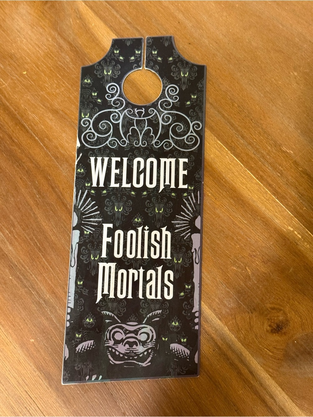 Disney Black “Welcome Foolish Mortals” Door Hanger